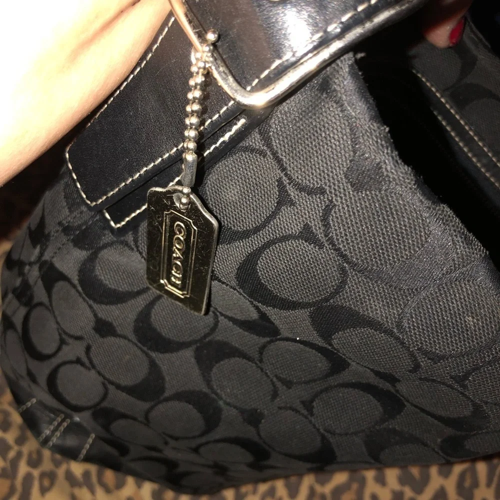 Coach black canvas monogram shoulder bag , leather trim see matching pieces